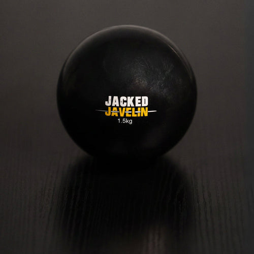 1.5kg Jacked Javelin overload plyo ball on a dark studio surface with reflection, strength-building throw ball