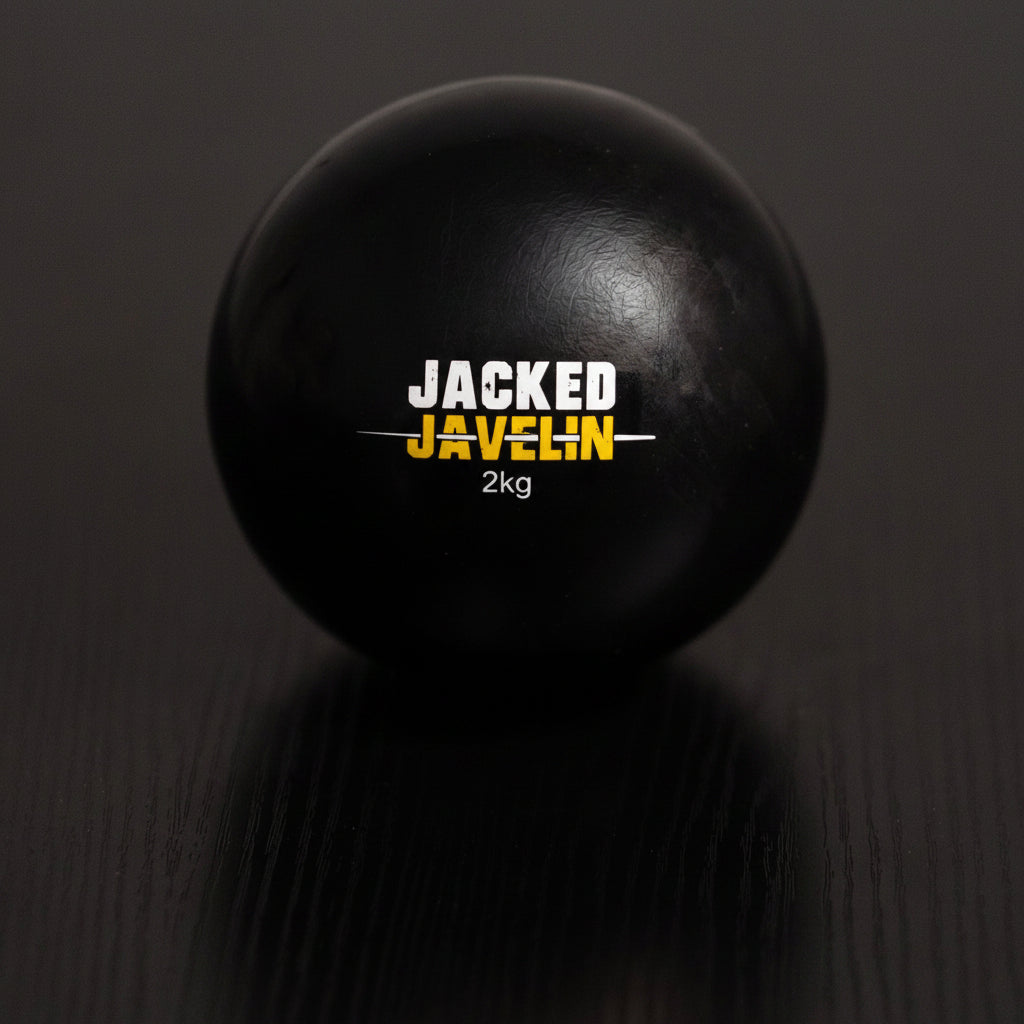 Jacked Javelin 2kg javelin plyo ball, heaviest black overload ball with gold logo, front view