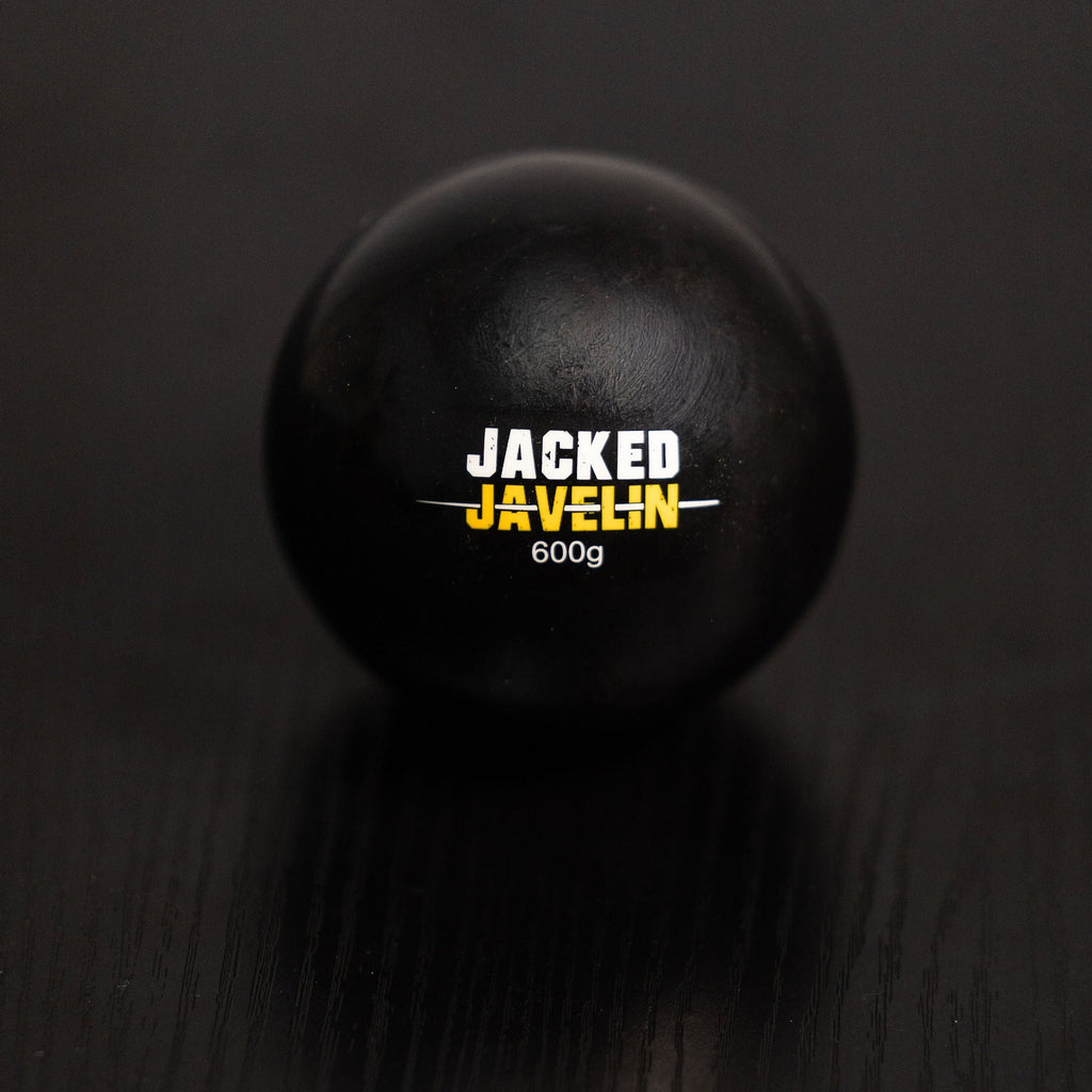 Jacked Javelin 600g javelin plyo ball, black rubber with gold logo, women's competition-weight training ball